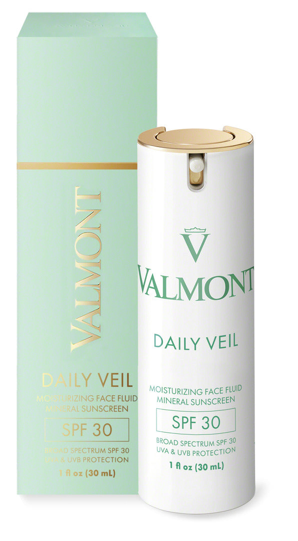 a white and gold container with a white label